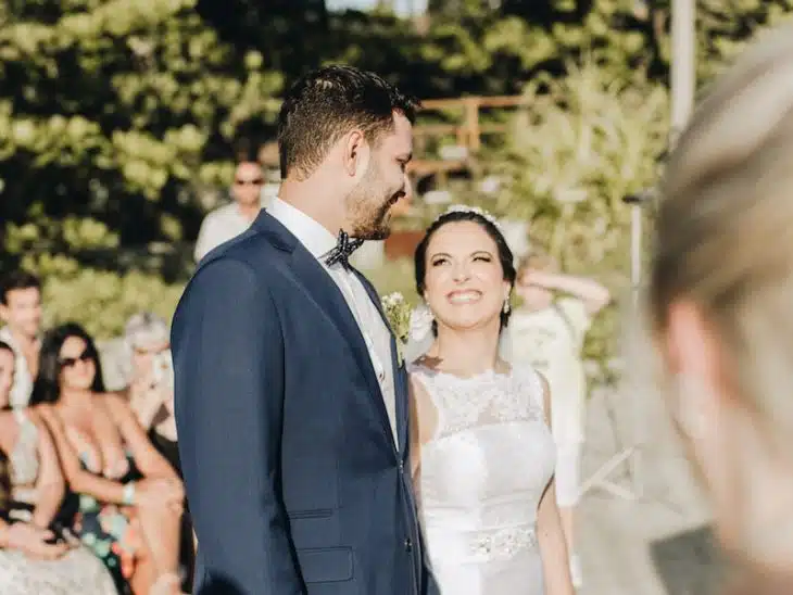 smiling newly wed couple at daytime